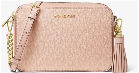 michael kors ginny medium messenger orange|Ginny Medium Logo Crossbody Bag .